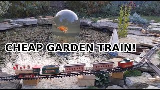 Building the Cheapest Possible Garden Railroad with Christmas Tree Trains!