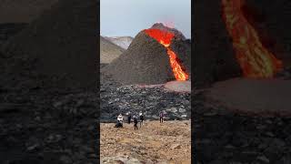 Daredevils Play Volleyball Beside Erupting Volcano