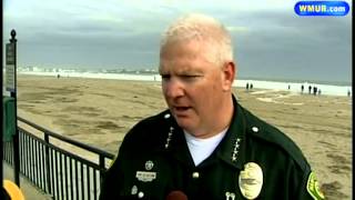 Hampton clears sand blown in by Sandy
