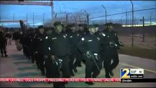 Ga. prison officers indicted, prison raided over cell phone scandal