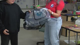 APS hands out clear backpacks for middle school students at 5 schools as policy goes into effect