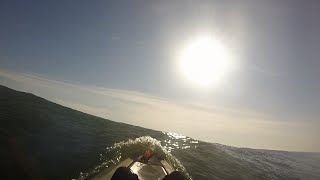 Flipped Kayak While Landing In The Surf