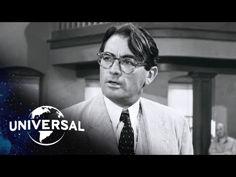 What do the black spectators do as Atticus?