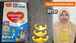 KALUNG ADAT DARI KARDUS BEKAS DAN KERTAS EMAS