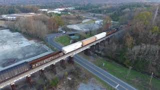 Evening Amtrak and NS 198 at Leeds Trestle