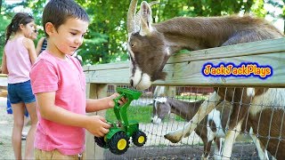 John Deere Toy Truck Play at the Park | Backhoe Tractors Feeding Goats & Deer | JackJackPlays