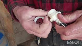 Repairing the automatic water system for our pigs