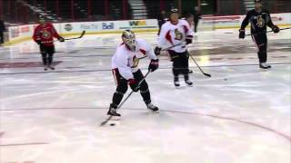 Erik Condra practices in goalie mask