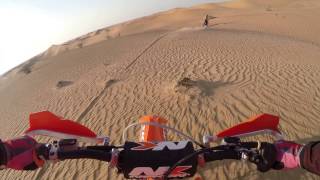 Dubai desert riding aboard a KTM 300cc 2 stroke