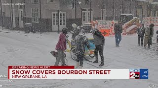 Snow covers Bourbon Street | VIDEO