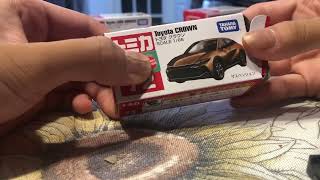 Tomica no.72 Toyota crown and Raymond Felipe at nxt