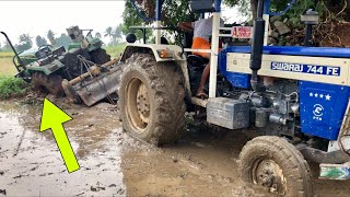 John Deere tractor stuck in mud and Swaraj 744 pulling out from mud