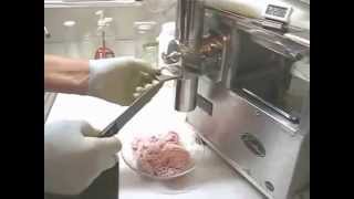 Making pomegranate banana frozen desert with a  Norwalk juicer