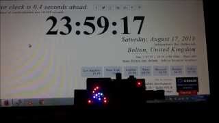 Binary Clock using a Pimoroni PiGlow striking midnight (24hr) on a Raspberry Pi - Example