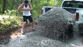 Unloading gravel the hard easy way (with a load handler)