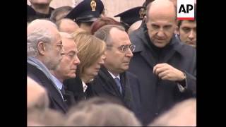 Widow attends service for Italian intelligence officer