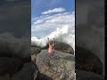 Girl Gets Swept Away By Waves While Posing On Rocks - 1178557