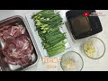 韭菜花炒肉片~stir fried pork slices with flowering garlic chives~