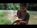 Survival skills - Primitive skills catch fish by bow and arrow - cooking fish Eating delicious