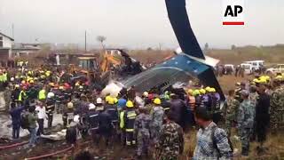 Emergency services at site of Nepal passenger plane crash