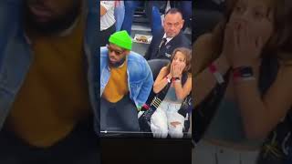 Young fan get a moment of lifetime sitting next to LeBron James during the Lakers game