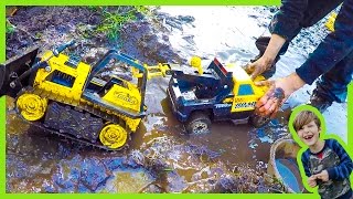 Tow Trucks and Construction Trucks in the MUD!