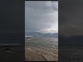 windstorm over wular lake boats battling the waves