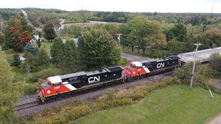 Awesome Aerial View! Brand New Rebuilds Lead Freight Train CN 305 w/DPU pass Berry Mills, NB