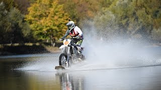 Water ride in Kvareli Lake, Georgia - Motorcycle on the water Husqvarna FX 350