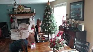 Delaney playing the Christmas song on xylophone