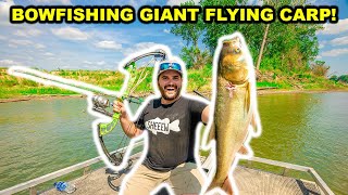 BOWFISHING Giant FLYING ASIAN Carp on the RIVER!!! (Catch Clean Cook)
