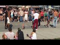 7 year old surprises street performers with a backflip