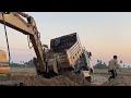 amazing dumb trucks stuck deep in mud recovery by excavator bulldozer