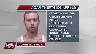 A Tiffin man arrested after stealing a car with another man sleeping inside