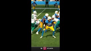 Joshua Kelley rushes for a 2-yard touchdown vs. Miami Dolphins