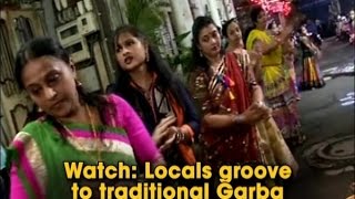 Watch: Locals groove to traditional Garba beats on Surat streets - ANI News