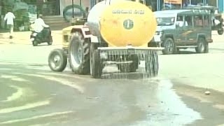 Karnataka CM Ride On Water Sprinkled Road On Drought Hit Areas