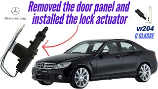 Mercedes C Class W204 Front door panel removed and universal central locking actuator installed