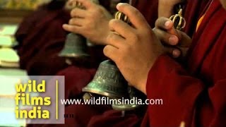 Buddhist monks offer prayer at Padmasambhava shrine, Mindrolling Monastery