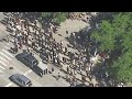 Protesters march in Detroit for 11th consecutive day