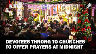 Devotees throng to churches to offer prayers at midnight, celebrate Christmas with joy