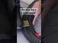 Use a block to remove a tight tire bead.  #shorts #tubeless