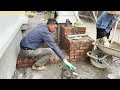 the design and construction of the side porch steps are completed with bricks and natural stone