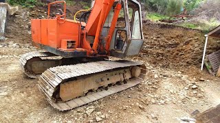 Fixing a Seized track roller on the Abandoned Excavator..