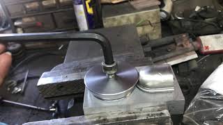 Shaping a 1942 Harley XA upper spark plug cover