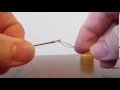 Threading a self threading needle