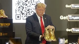 Man buys Trump’s gold sneakers for nine grand at auction