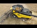 new holland cr11 with 50ft. wide macdon fd250 header harvesting barley harvest 2024