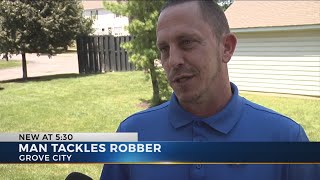 Customer stops robbery suspect at gas station