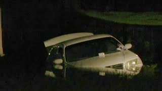 Crash sends car into pond at Waterford Lakes